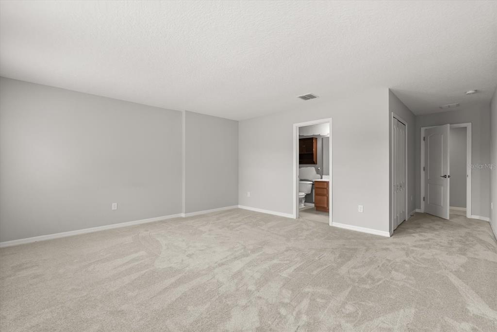 4345 Saltmarsh Sparrow Drive Windermere, FL 34786 - Photo 29 of 46 a view of an empty room with closet and entryway