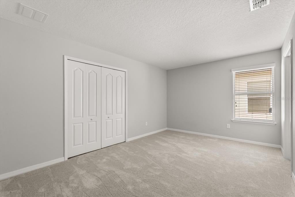 4345 Saltmarsh Sparrow Drive Windermere, FL 34786 - Photo 32 of 46 an empty room with a window