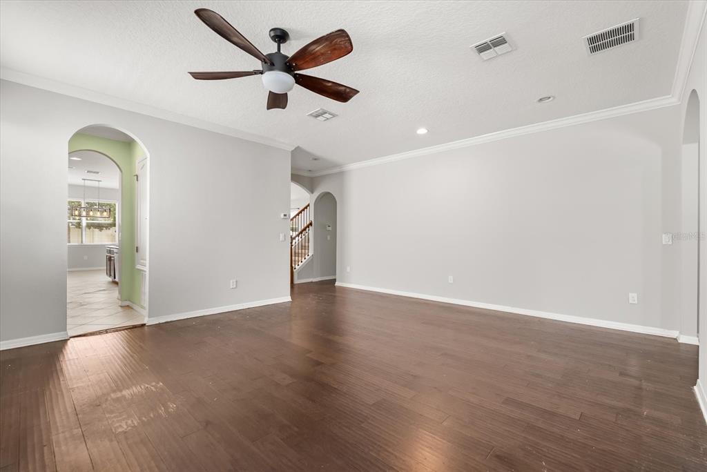 4345 Saltmarsh Sparrow Drive Windermere, FL 34786 - Photo 8 of 46 a view of a livingroom with wooden floor