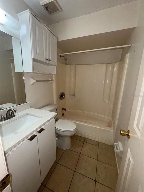 170 Windtree Lane Winter Garden, FL 34787 - Photo 13 of 14 a bathroom with a sink a toilet and shower