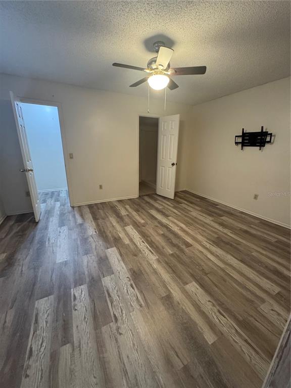 170 Windtree Lane Winter Garden, FL 34787 - Photo 8 of 14 a view of a livingroom with wooden floor