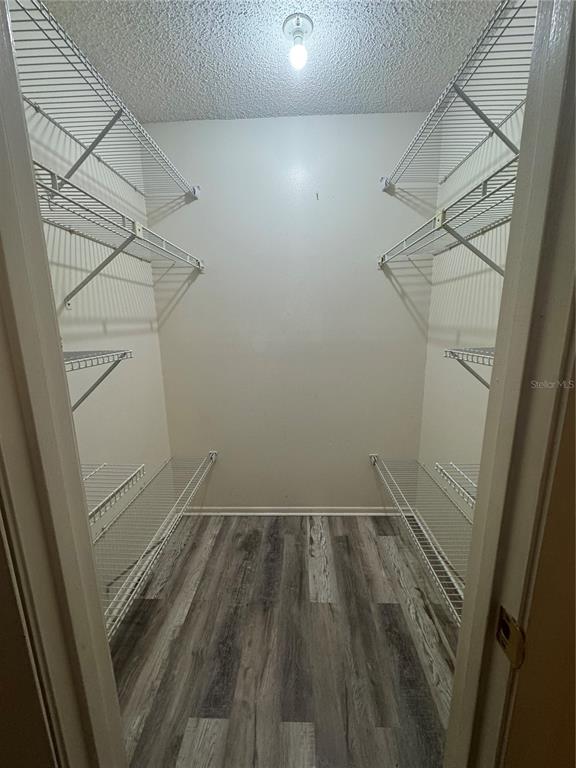 170 Windtree Lane Winter Garden, FL 34787 - Photo 9 of 14 a view of a room with racks on the wall