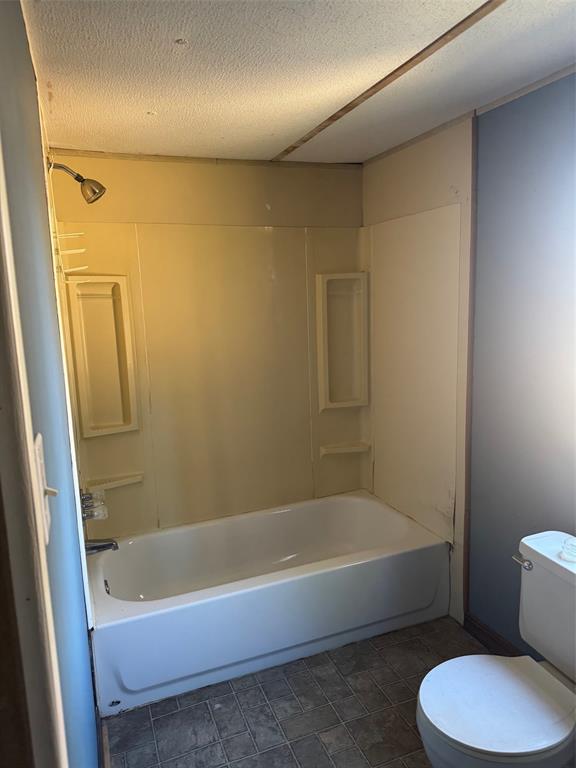 593 Ayers Jamestown, LA 71045 - Photo 7 of 22 a bathroom with a tub and a shower