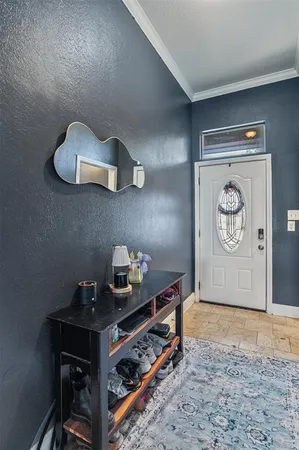 a bedroom with a bed and a baby crib