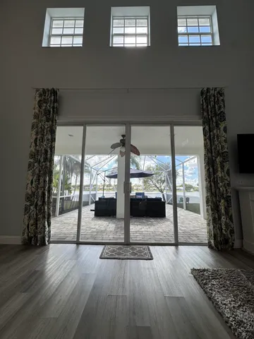 a view of a living room and window