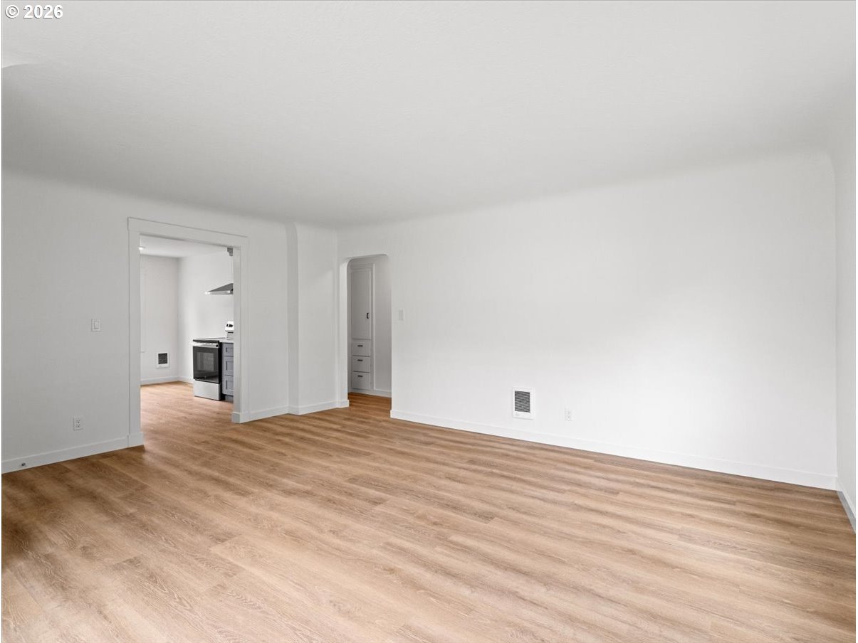 440 25th Avenue Longview, WA 98632 - Photo 3 of 27 a view of empty room with wooden floor