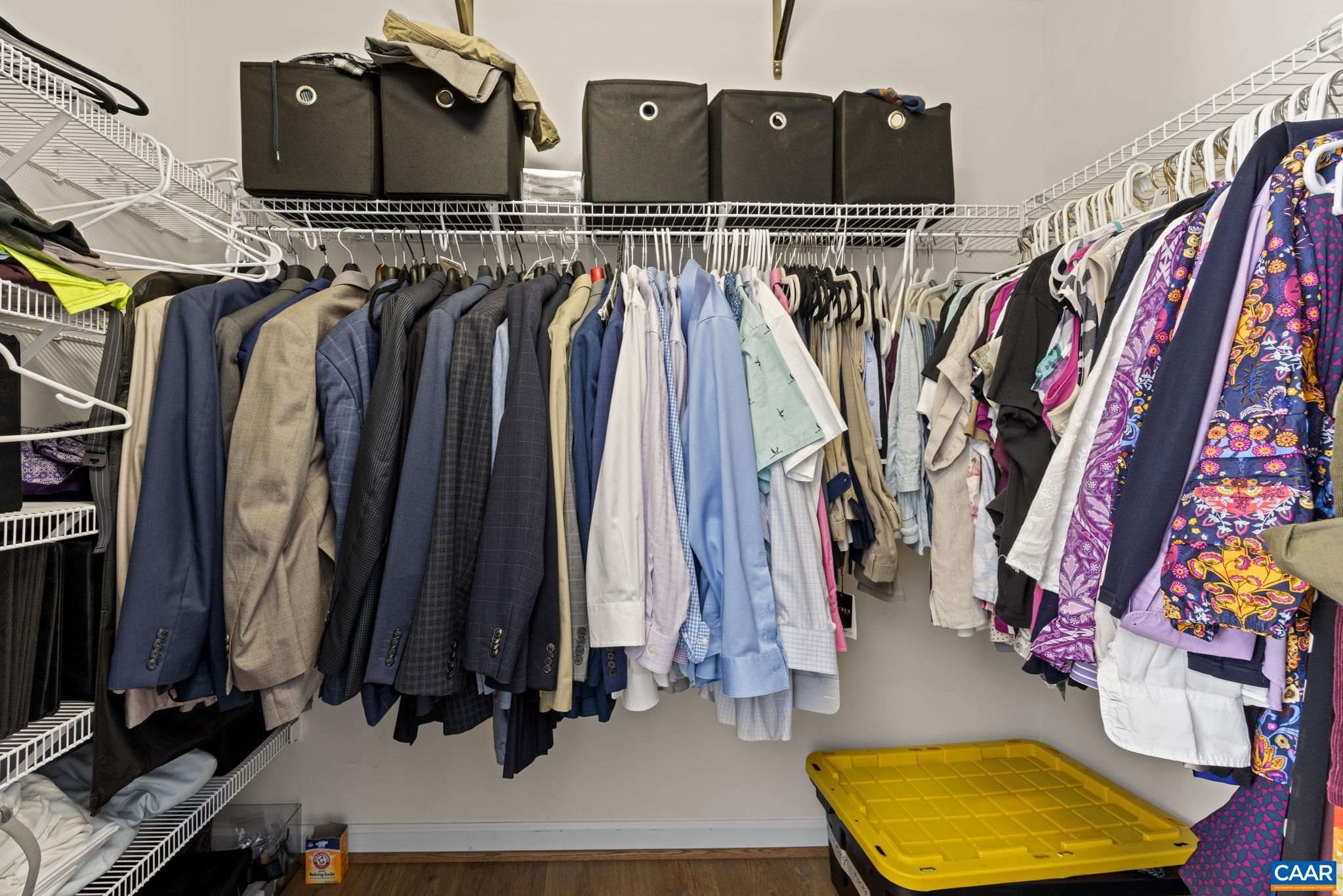 464 Hummingbird Road Scottsville, VA 24590 - Photo 20 of 31 a view of walk in closet with clothes and shoes