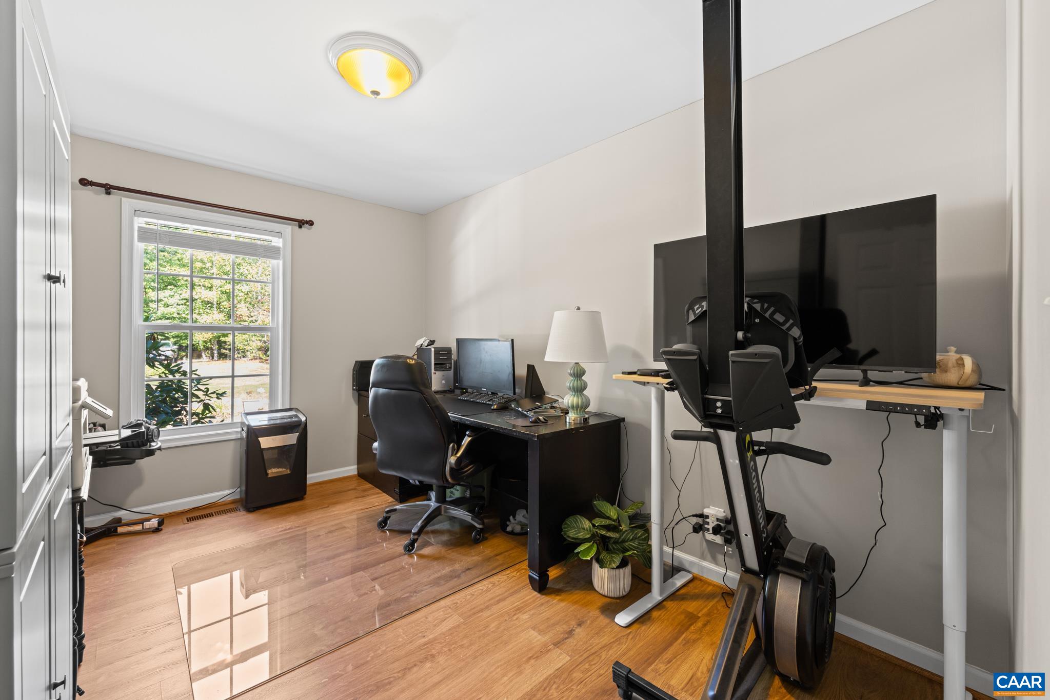 464 Hummingbird Road Scottsville, VA 24590 - Photo 22 of 31 a view of a workspace with furniture and a window