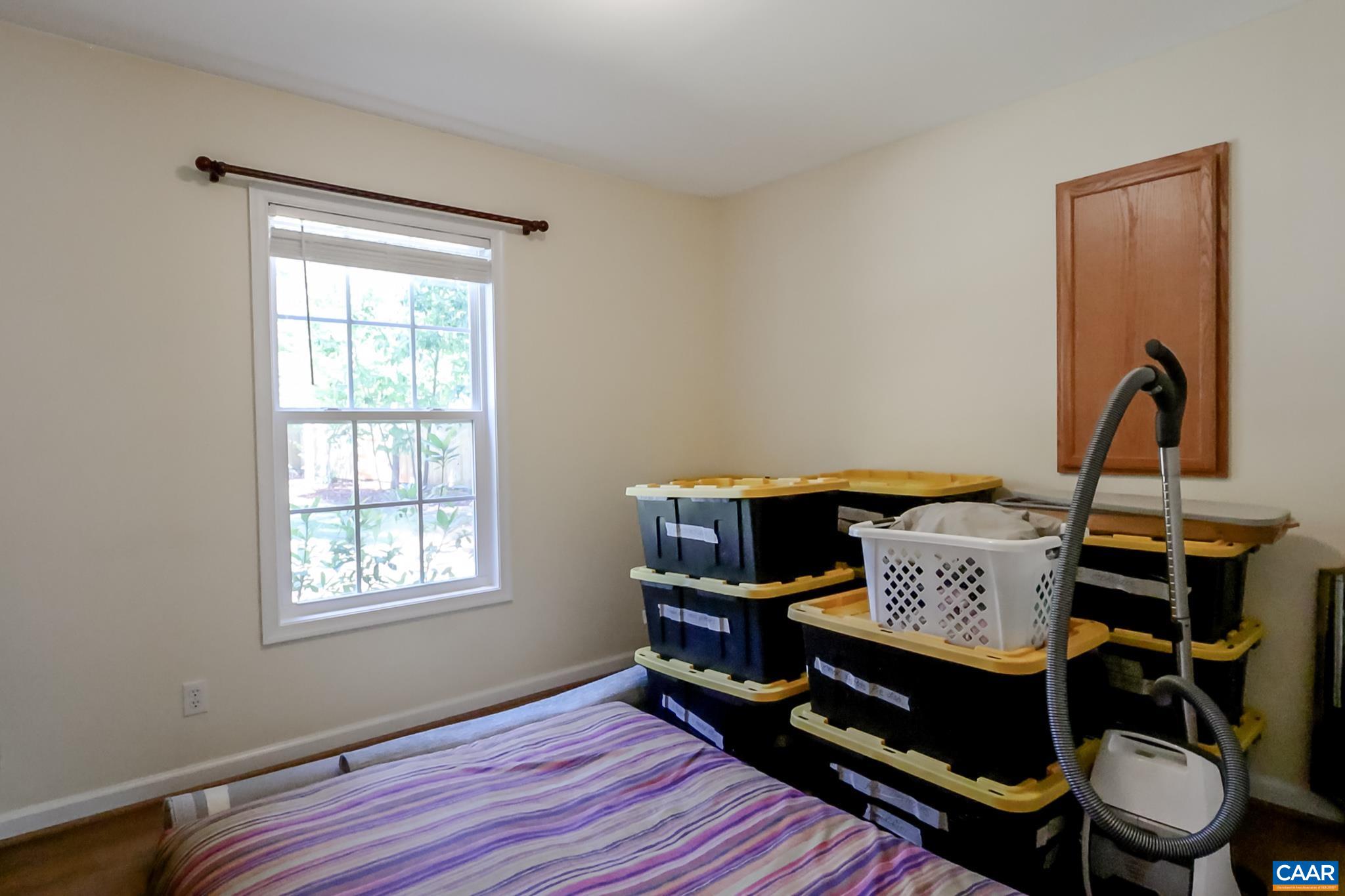 464 Hummingbird Road Scottsville, VA 24590 - Photo 23 of 31 a living room with furniture and a window