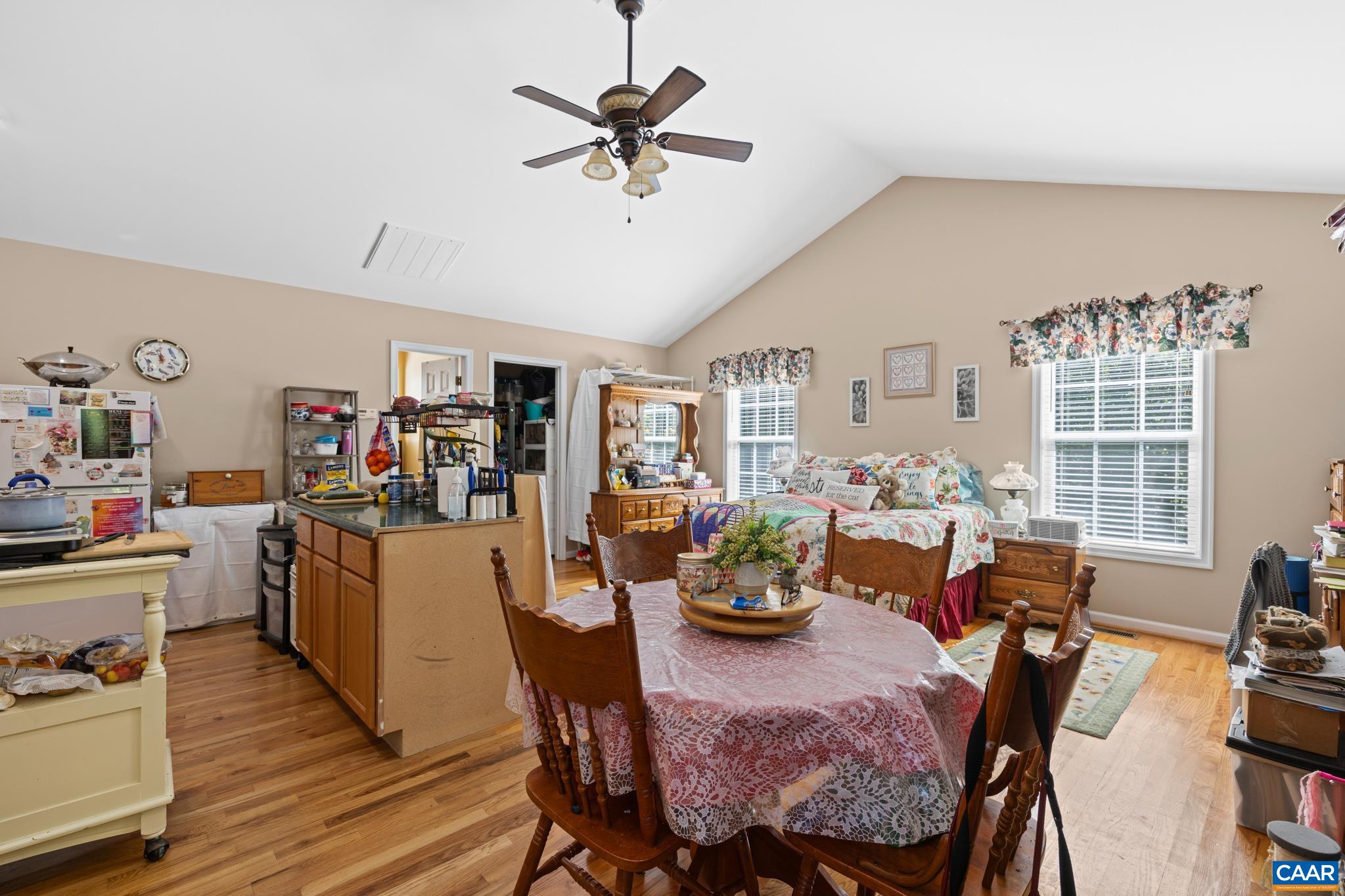 464 Hummingbird Road Scottsville, VA 24590 - Photo 24 of 31 a view of a dining room with furniture and a livingroom