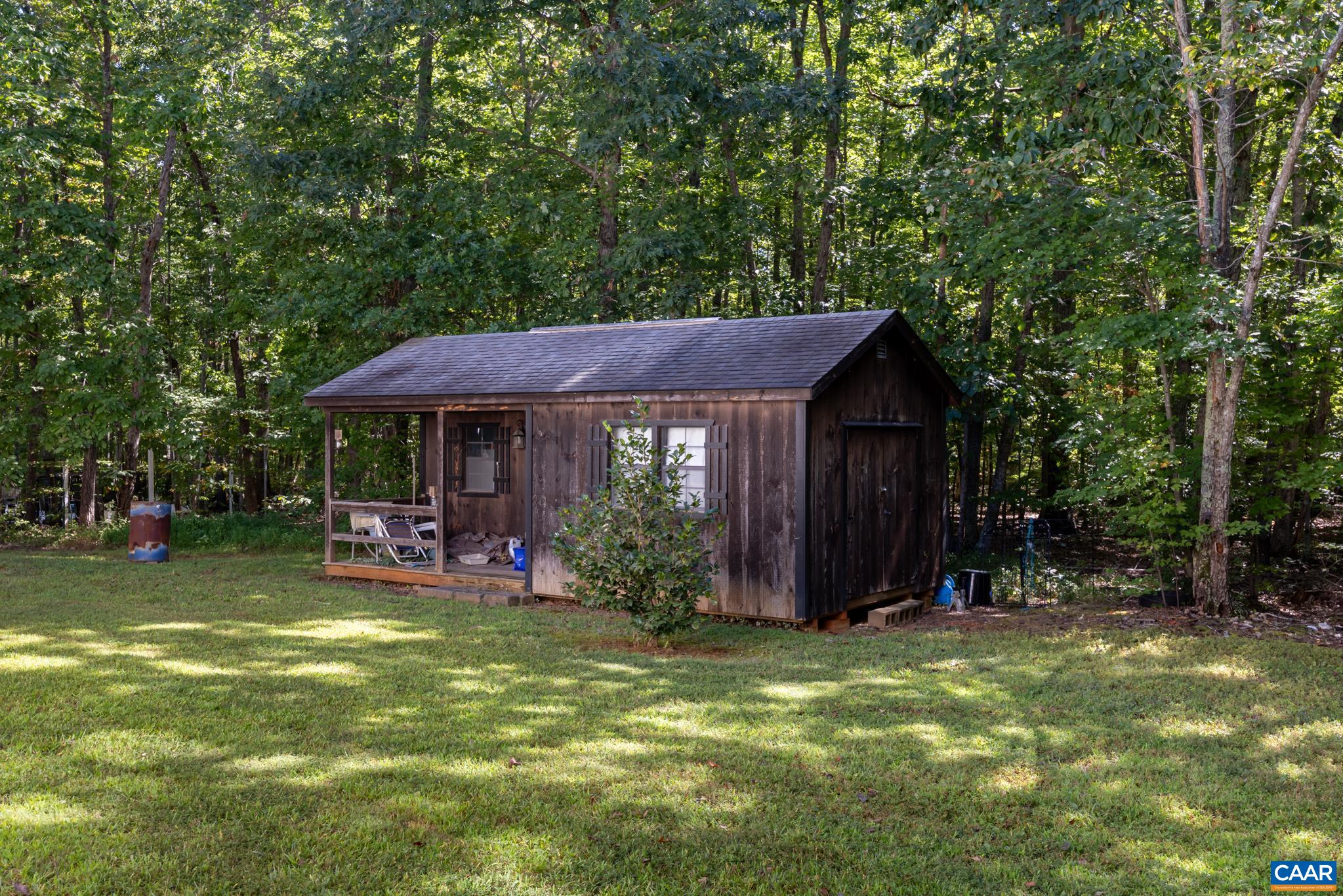 464 Hummingbird Road Scottsville, VA 24590 - Photo 29 of 31 a view of a house with backyard porch and sitting area