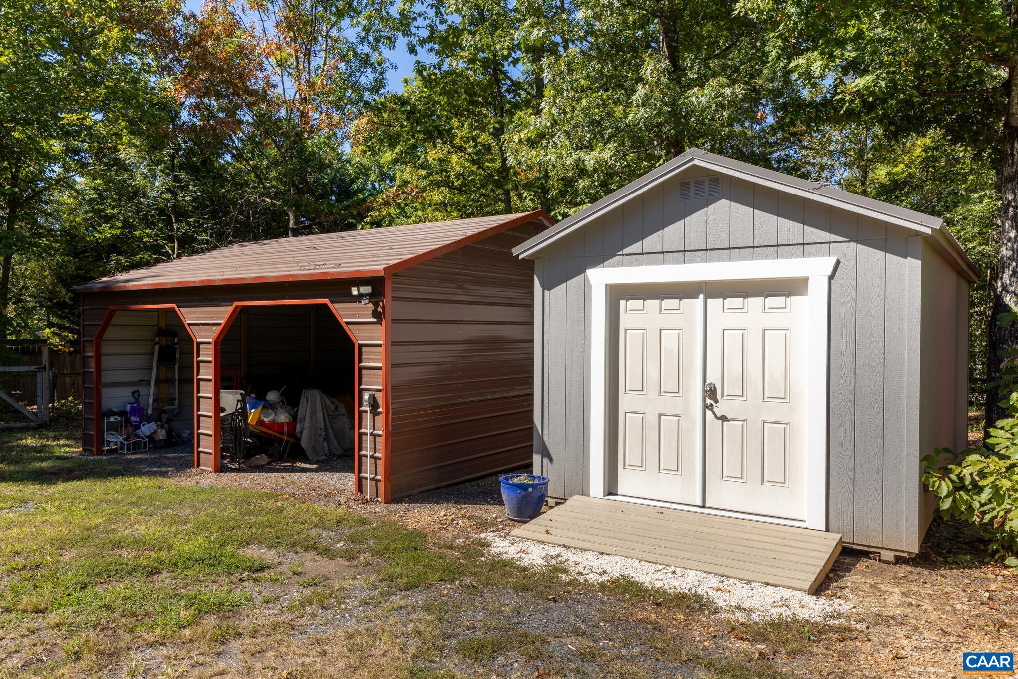 464 Hummingbird Road Scottsville, VA 24590 - Photo 3 of 31 a front view of a house with a yard