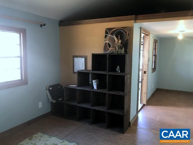 464 Hummingbird Road Scottsville, VA 24590 - Photo 31 of 31 a view of walk in closet with clothes and shoes