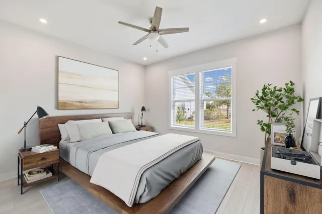 an aerial view of residential houses with outdoor space