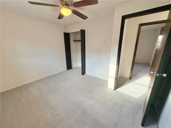 a view of a room with staircase