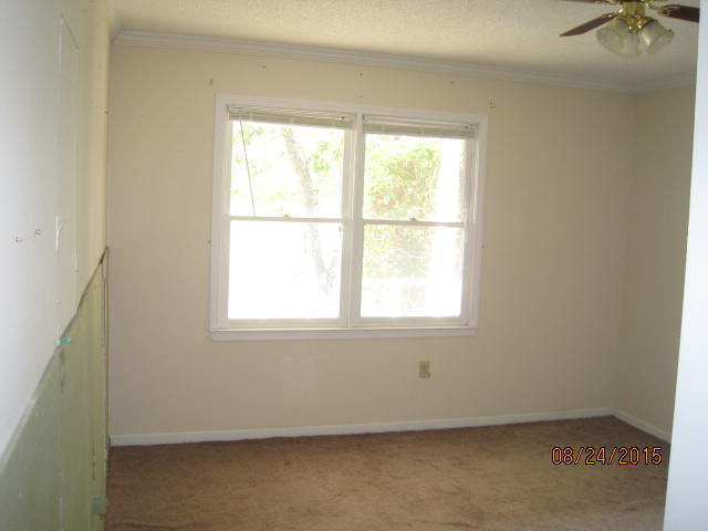 1256 Hamlin Road Lizella, GA 31052 - Photo 11 of 15 an empty room with a window