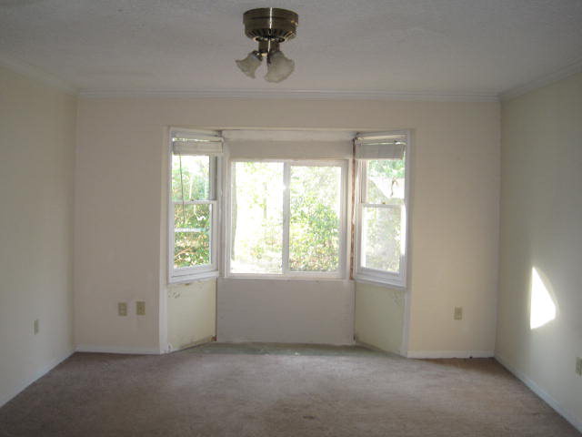 1256 Hamlin Road Lizella, GA 31052 - Photo 13 of 15 an empty room with windows
