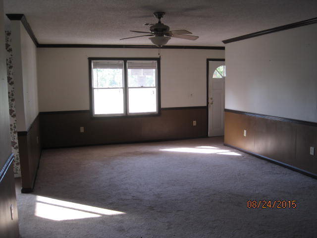 1256 Hamlin Road Lizella, GA 31052 - Photo 4 of 15 a view of an empty room with a window