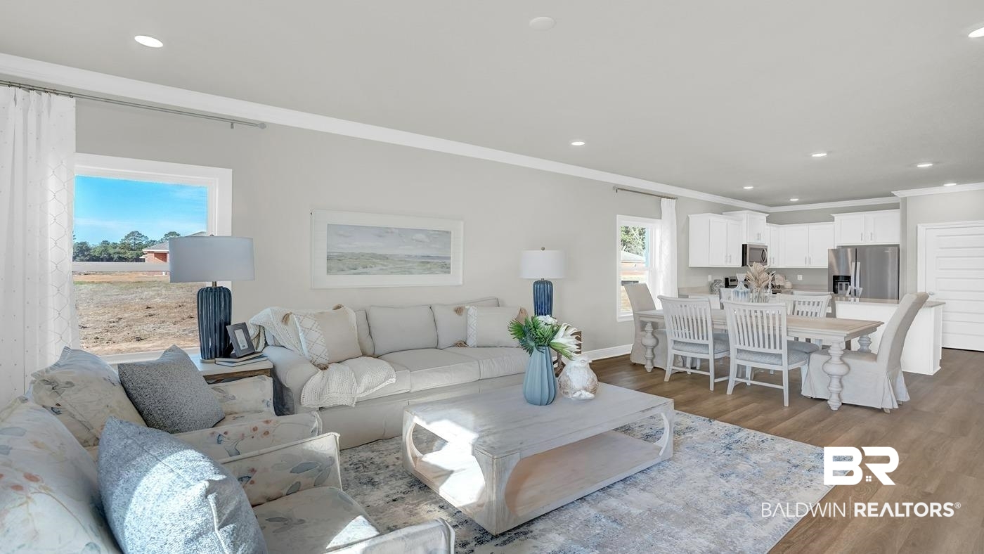 13312 Shea Circle Foley, AL 36535 - Photo 2 of 17 Open-concept living area featuring wood-finish flooring, recessed lighting, and crown molding