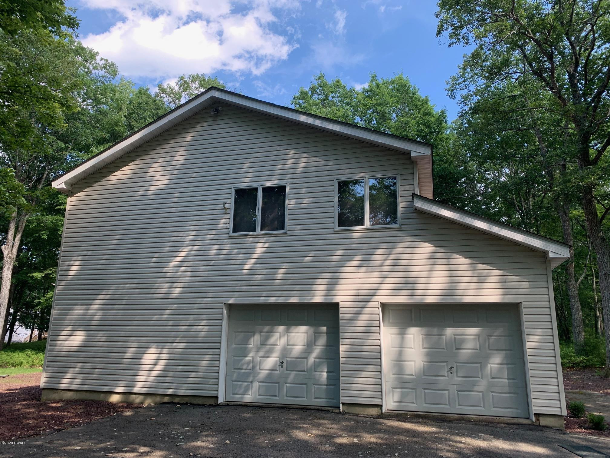 218 Maple Ridge Drive Hawley, PA 18428 - Photo 5 of 46 Garage doors