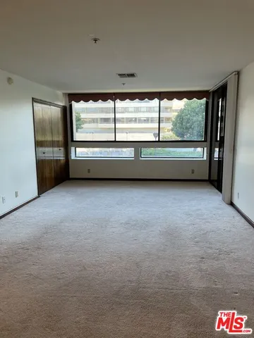 a view of empty room with window