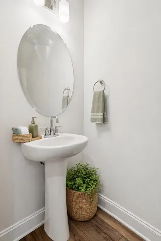 a bathroom with a sink and mirror