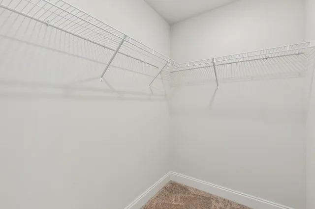 a view of a room with racks on the wall