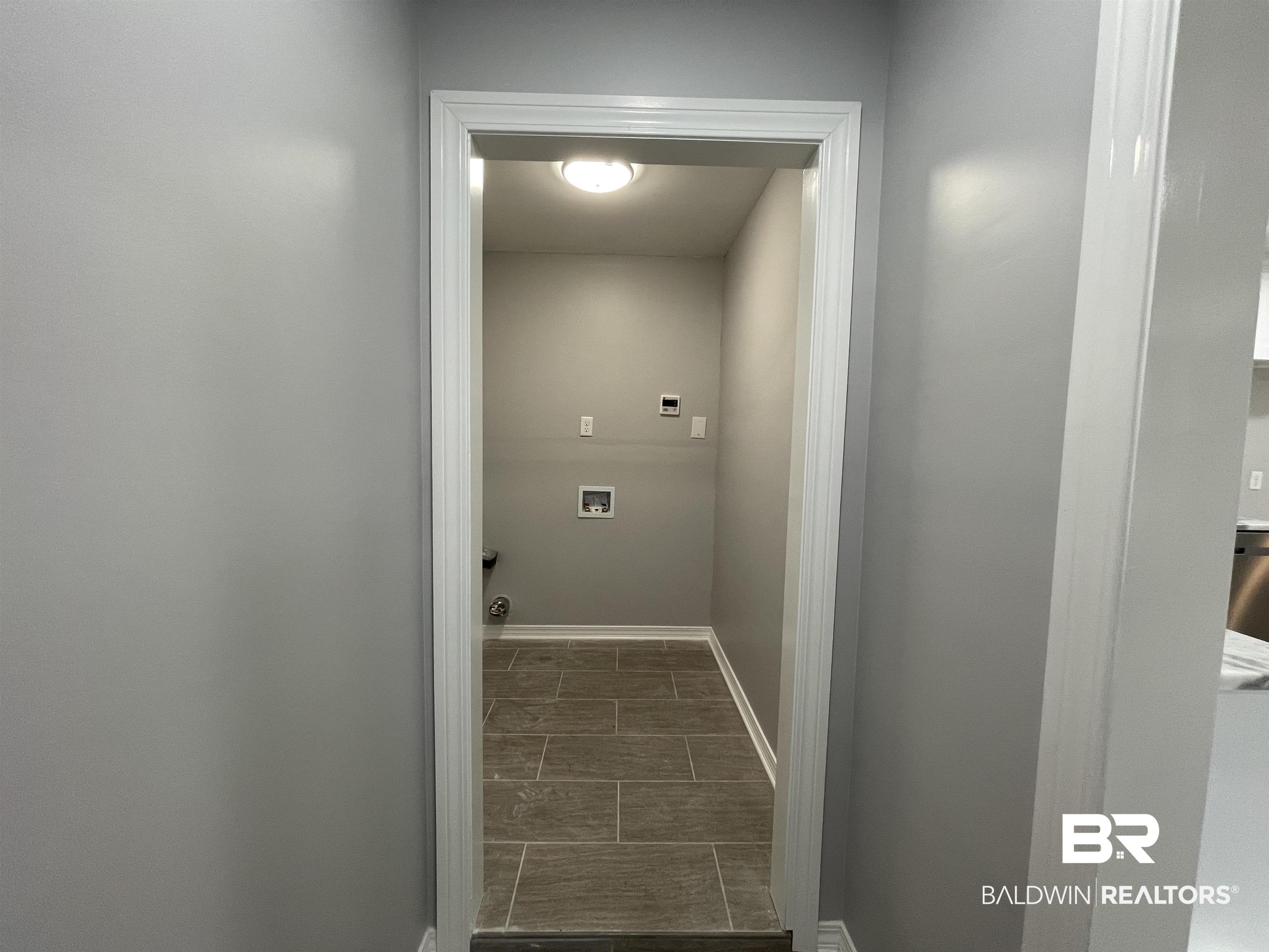 3901 Prima Vera Lane Mobile, AL 36605 - Photo 8 of 15 Laundry room featuring washer hookup