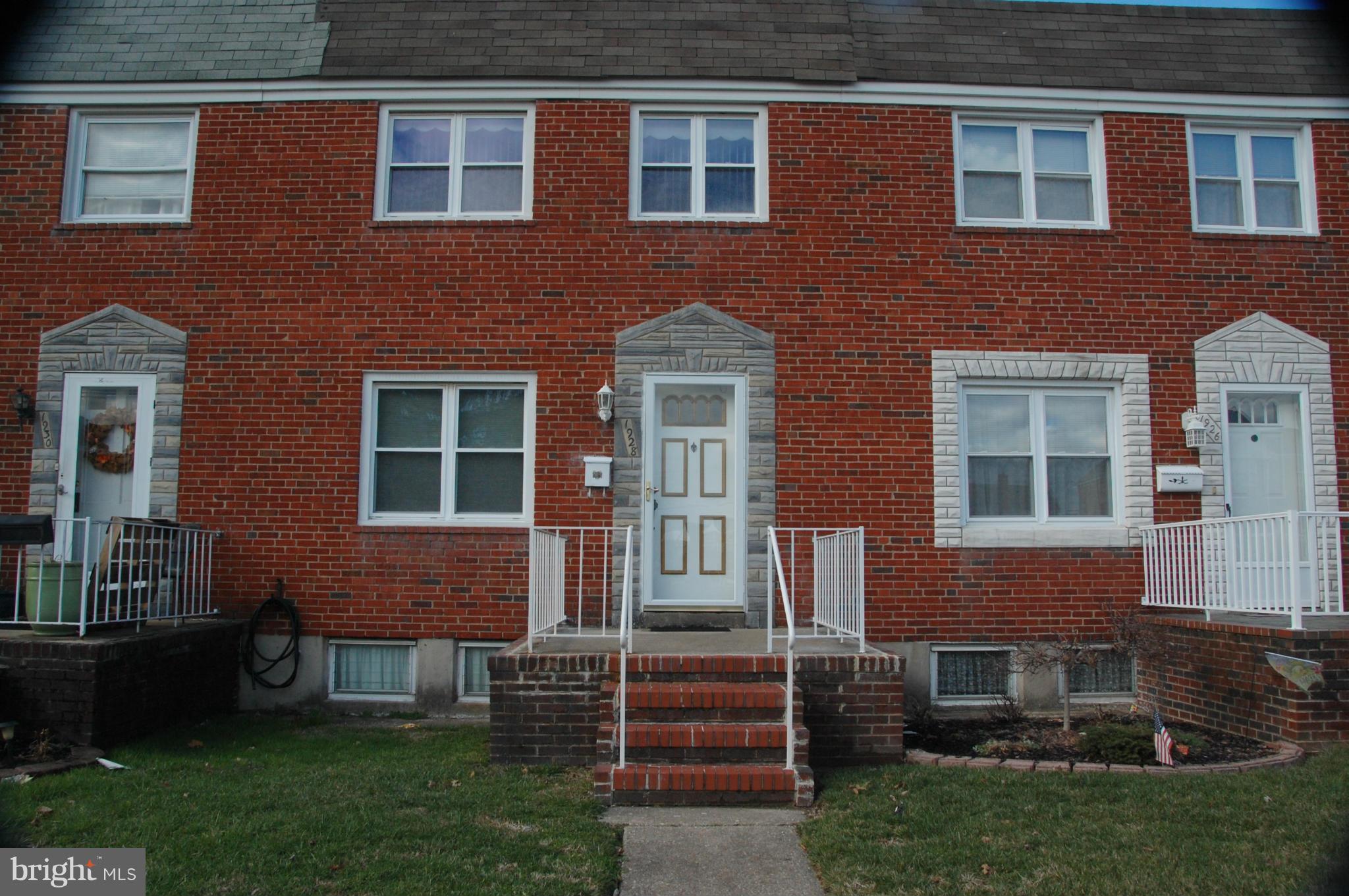 1928 Church Road Dundalk, MD 21222 - Photo 1 of 18 a brick building that has a lots of windows in it