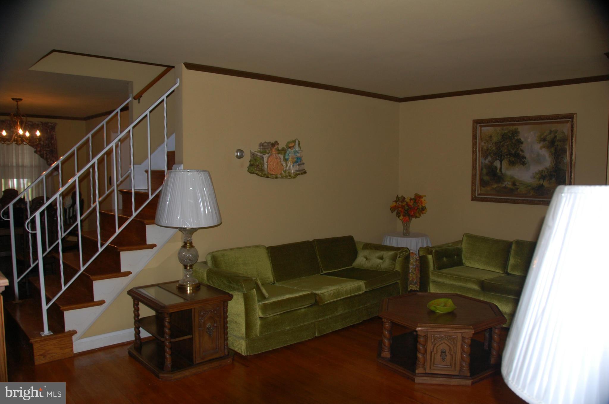 1928 Church Road Dundalk, MD 21222 - Photo 2 of 18 a living room with furniture and a wooden floor