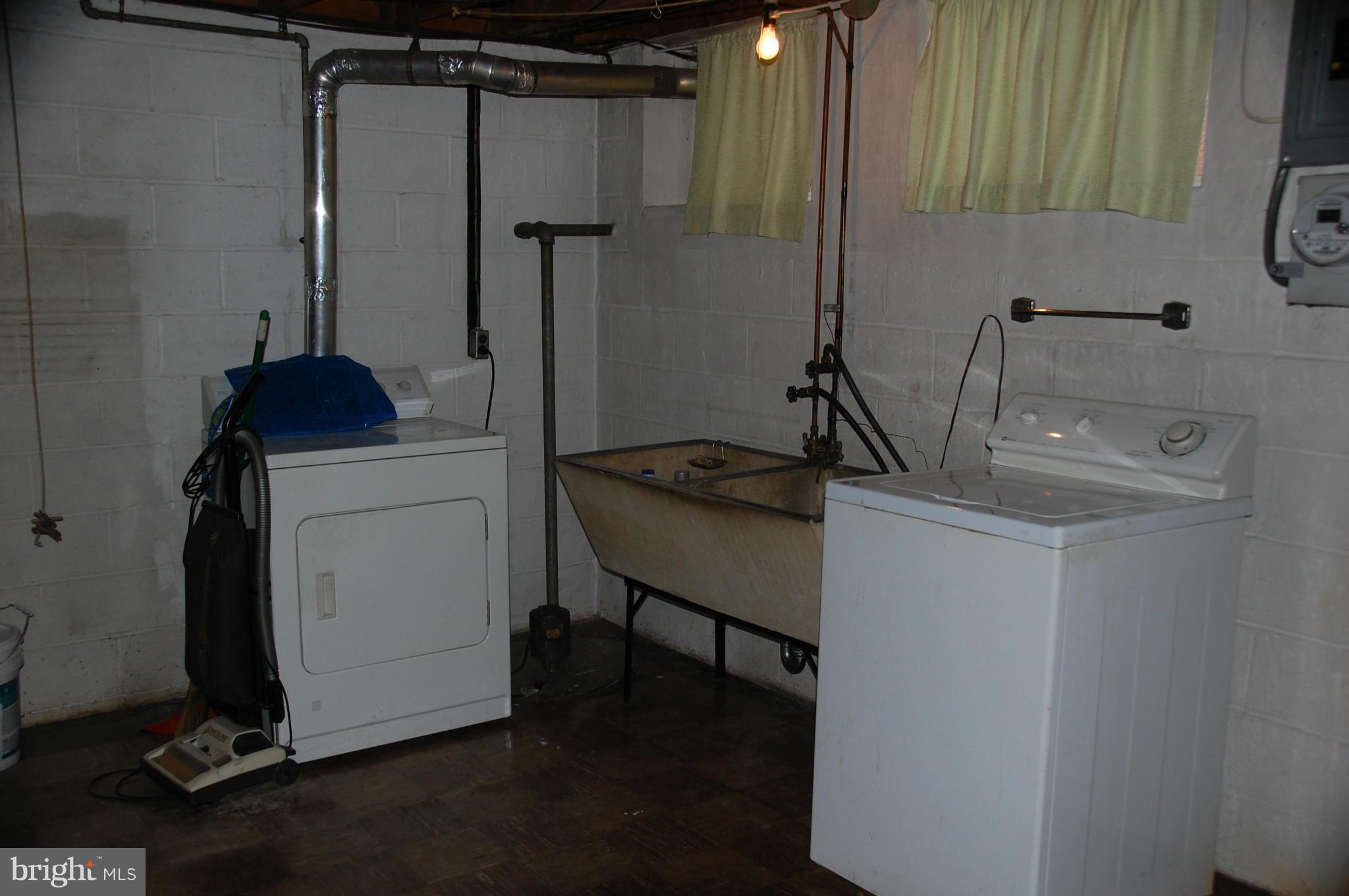 1928 Church Road Dundalk, MD 21222 - Photo 15 of 18 a bathroom with a sink and a mirror