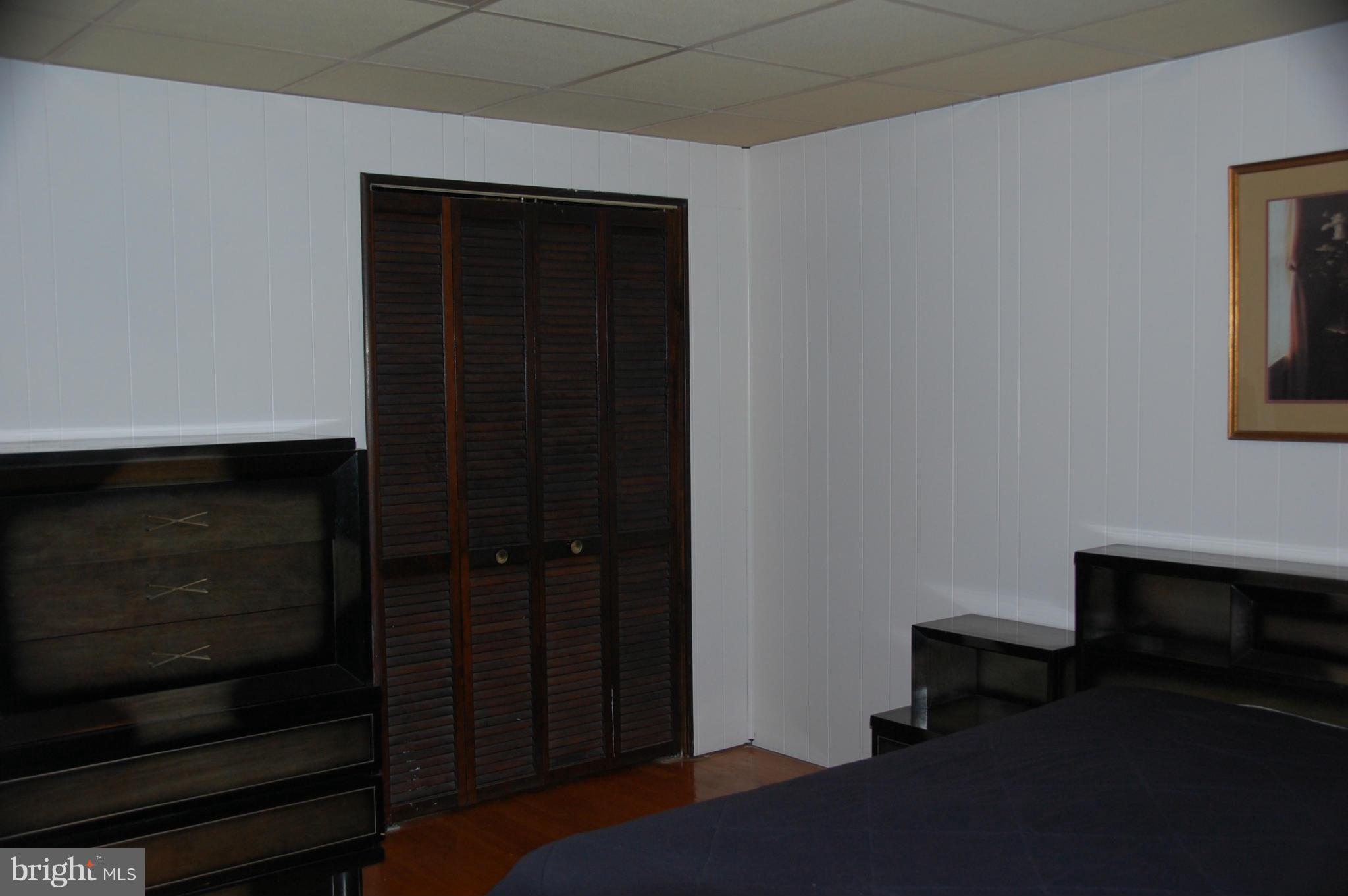 1928 Church Road Dundalk, MD 21222 - Photo 10 of 18 a view of bedroom with hallway and closet