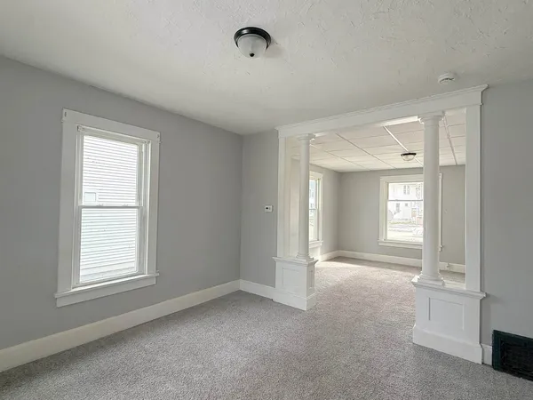 an empty room with windows