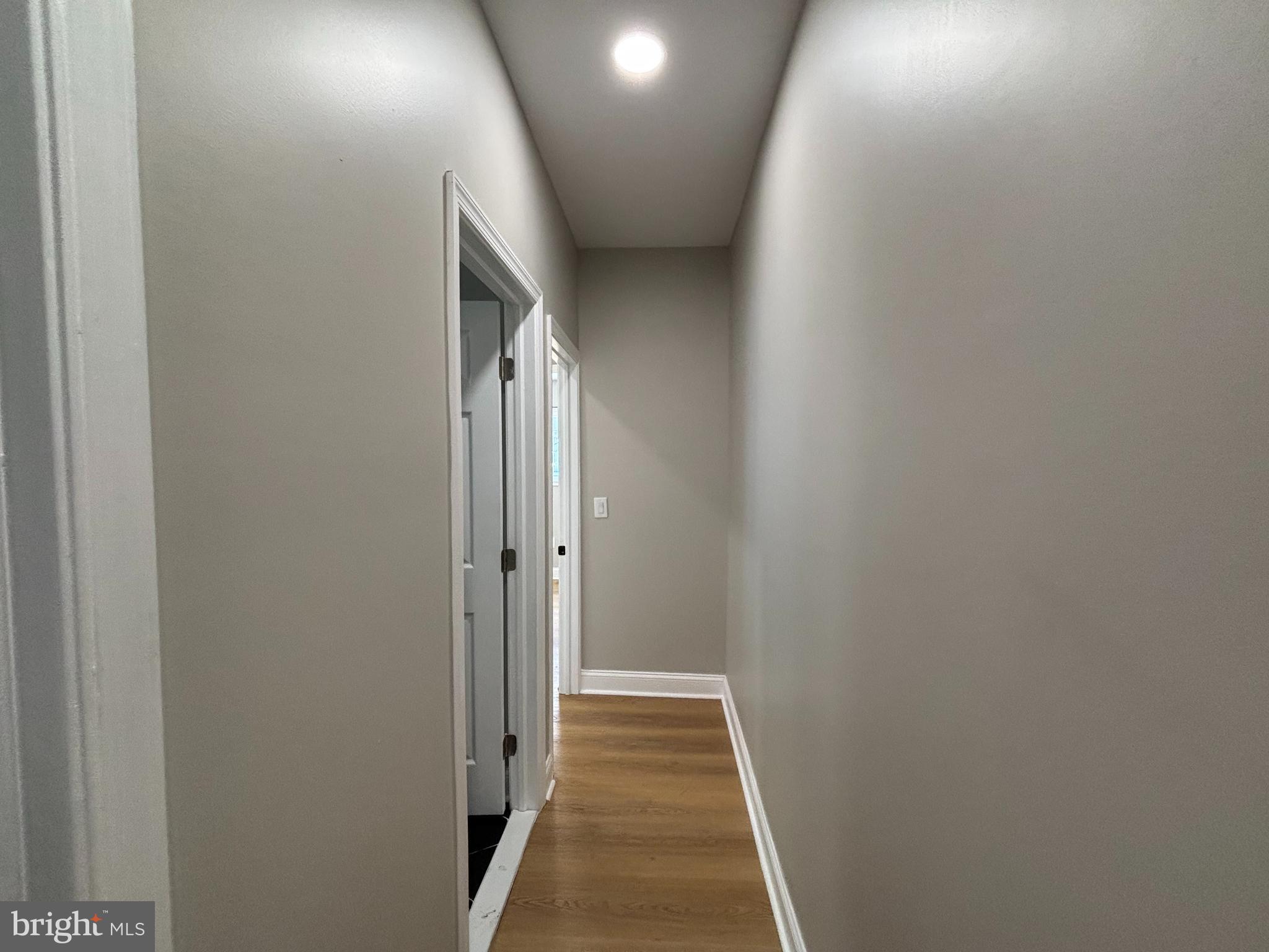 6344 Reedland Street, Unit 2 Philadelphia, PA 19142 - Photo 2 of 6 a view of hallway with wooden floor