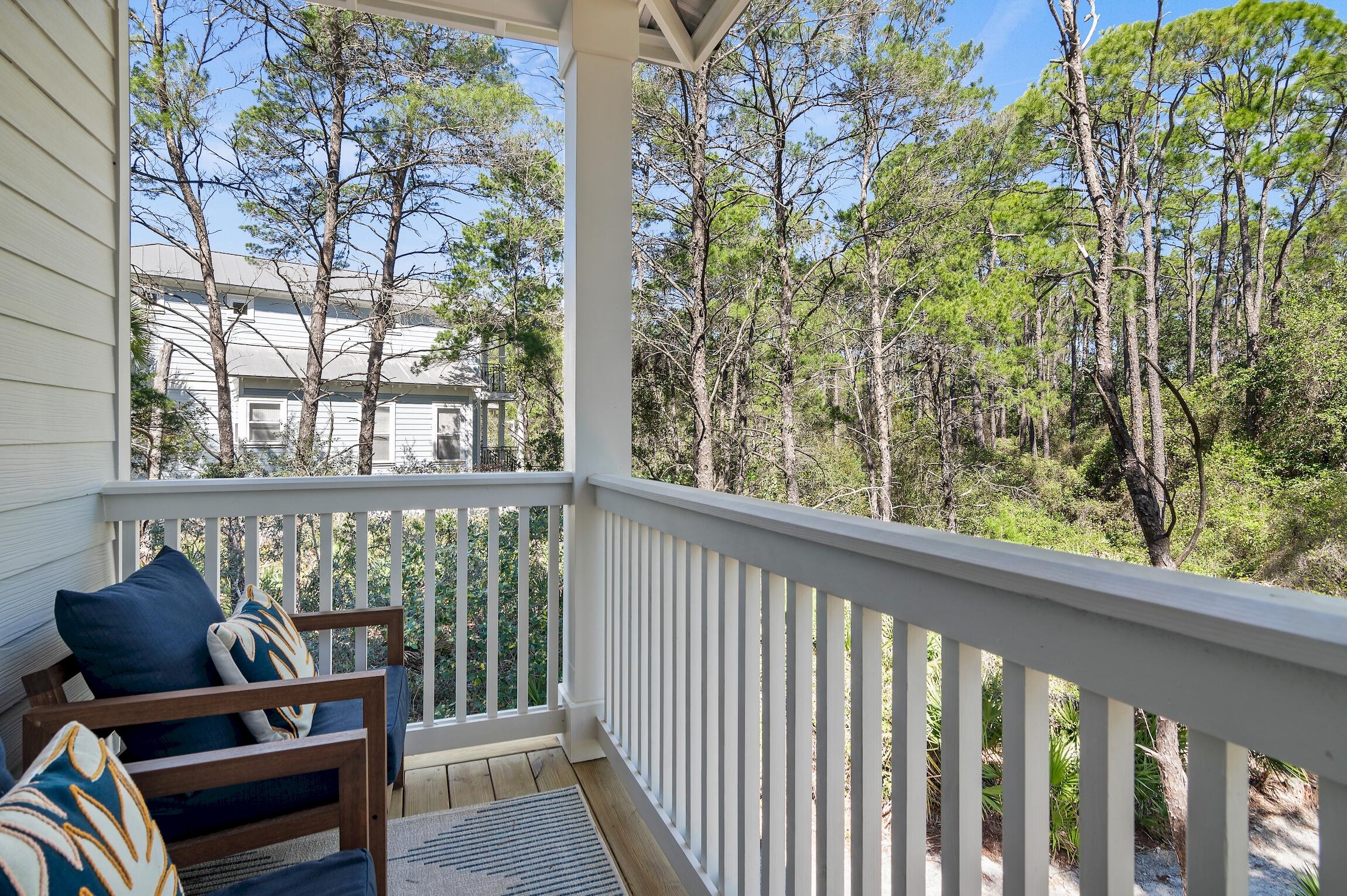 59 Lifeguard Loop Inlet Beach Inlet Beach, FL 32461 - Photo 20 of 47 a view of a balcony with chairs