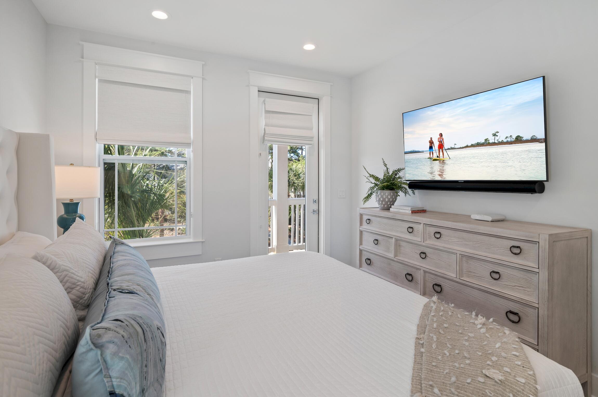 59 Lifeguard Loop Inlet Beach Inlet Beach, FL 32461 - Photo 31 of 47 a bedroom with a bed and a flat screen tv