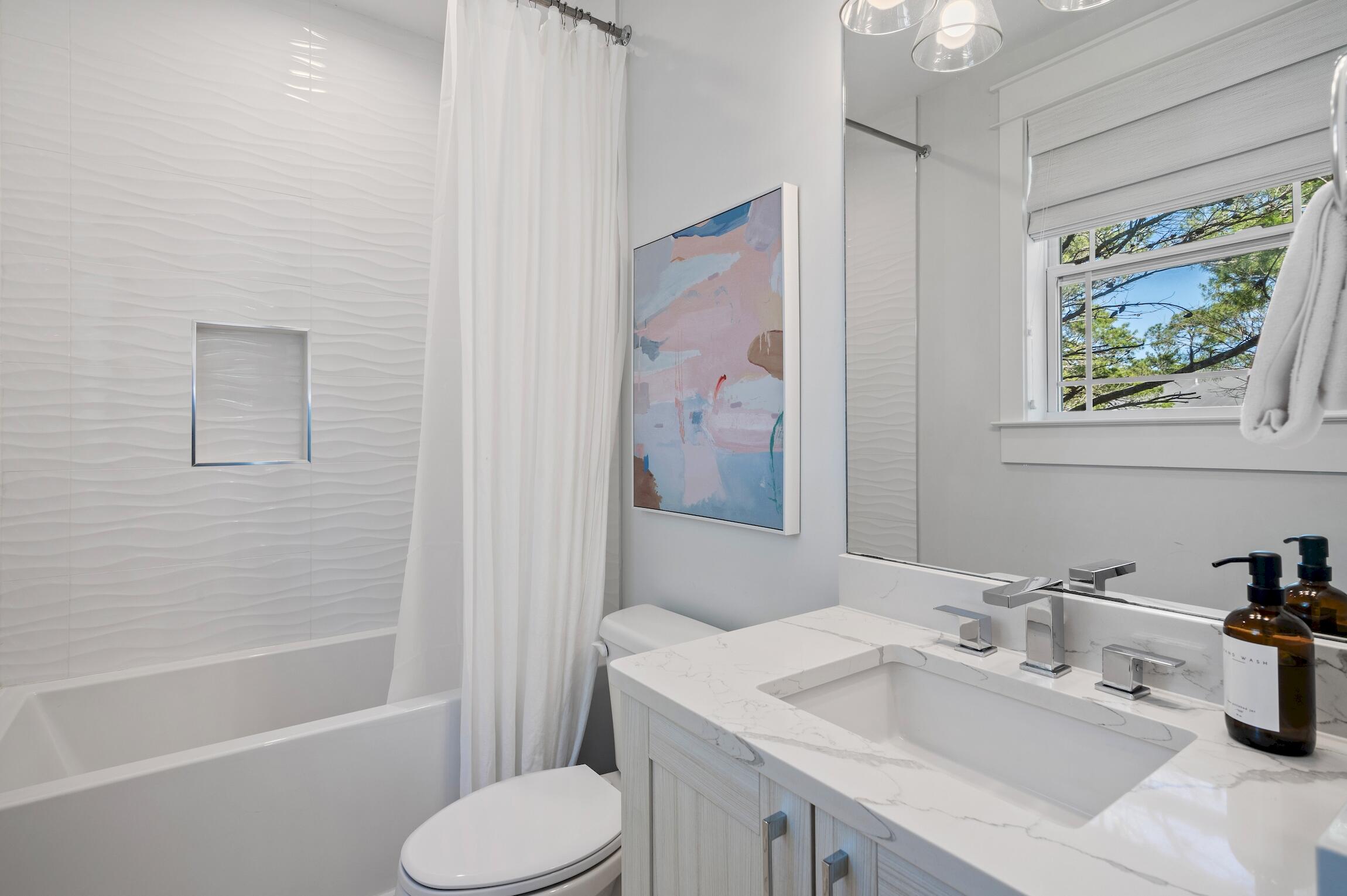59 Lifeguard Loop Inlet Beach Inlet Beach, FL 32461 - Photo 35 of 47 a bathroom with a sink toilet and bathtub
