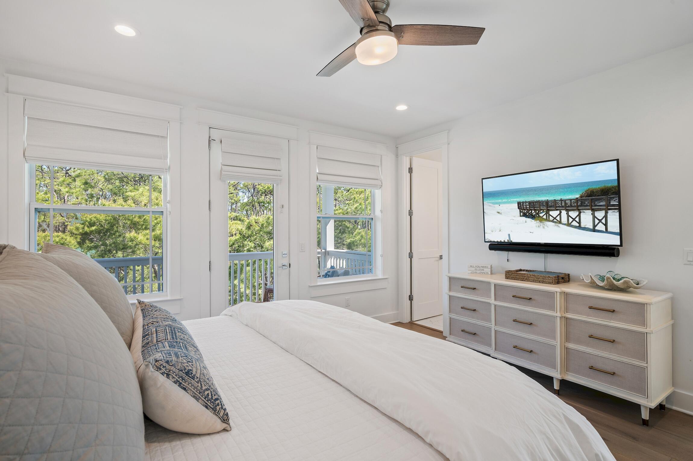 59 Lifeguard Loop Inlet Beach Inlet Beach, FL 32461 - Photo 38 of 47 a bedroom with a bed and a television