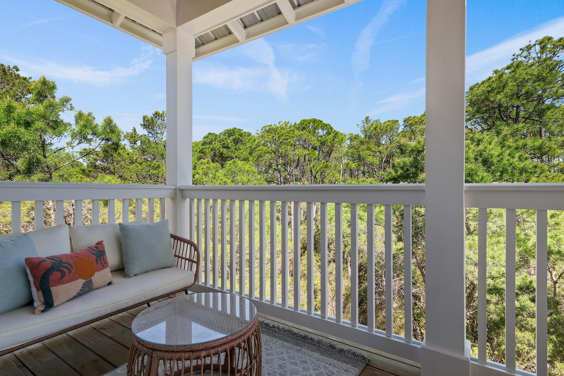 59 Lifeguard Loop Inlet Beach Inlet Beach, FL 32461 - Photo 5 of 47 a balcony with table and chairs
