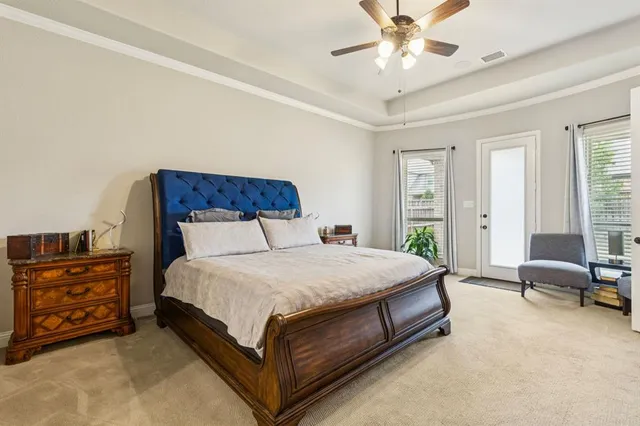 a bedroom with a bed and furniture