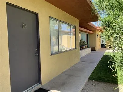 a view of a porch with seating space