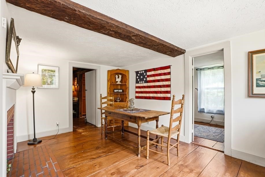 52 Elm Street Upton, MA 01568 - Photo 6 of 42 a view of a livingroom with furniture and a window