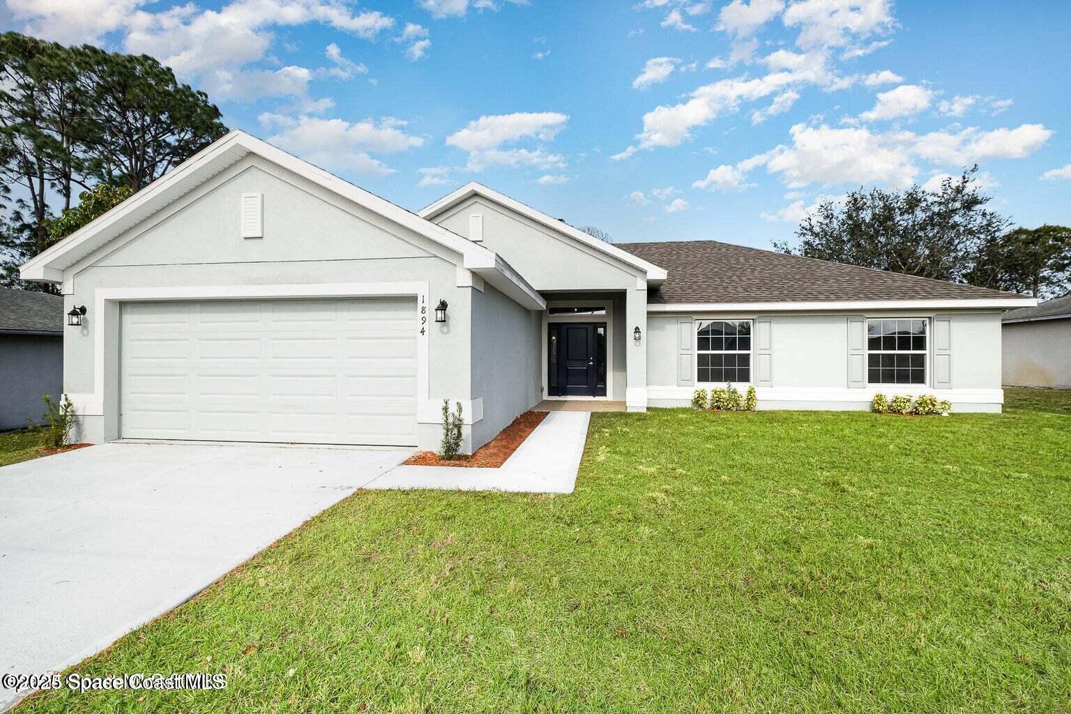 142 Saybrook Road Southwest Palm Bay, FL 32908 - Photo 1 of 15 IMG_4571