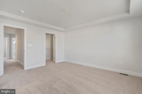 an empty room with an entryway