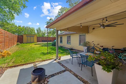 a view of a patio with chair and table