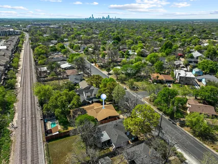an aerial view of a city with lots of residential buildings