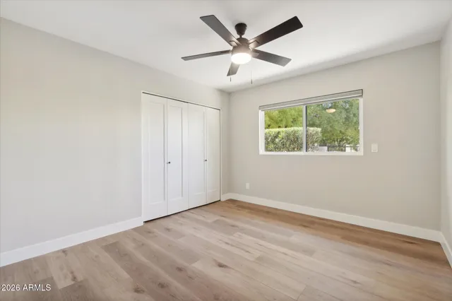 a view of a room with a big yard