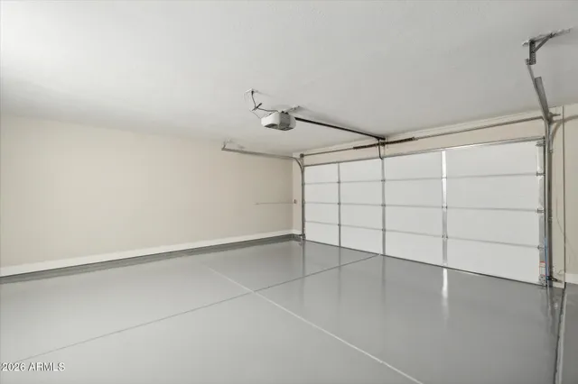 a view of a house with swimming pool and a yard