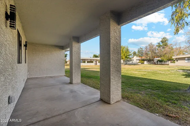 a view of residential houses with outdoor space