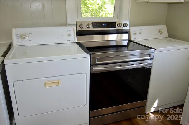 a utility room with dryer and washer